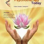 Hands holding a blooming lotus flower symbolizing healing and hope in psychotherapy.