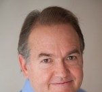 Gender Based Changes to Manage Stress: Portrait of a middle-aged man smiling gently.