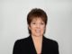 The Sacred Path of the Therapist: An Author’s Reflection Professional portrait of a middle-aged woman in a black blazer.