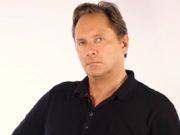 How to stay with the how: Some pedagogical suggestions on assisting the mindful sensing of the body A serious man in a black polo shirt posing against a plain background.