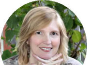 Life Notes: The Yoga of Midlife Smiling woman with blonde hair posing outdoors.