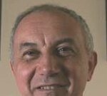 Active Pause® Part 1- Featured Article Smiling elderly man with short gray hair.