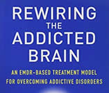 Rewiring the Addicted Brain with EMDR- Based Treatment Book cover titled 'Addicted Brain' about addiction treatment.