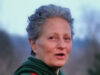 When The Past Floods The Present: Regression, Flashbacks, and the Art of Coming Home Person outdoors with short gray hair, green hoodie